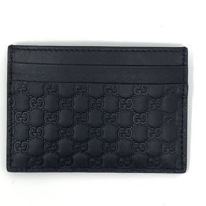 Authentic Gucci Black Micro Guccissma card holder never used.